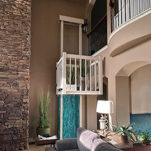 Galaxy Shuttle+ cargo lift in an upscale interior with a teal accent wall